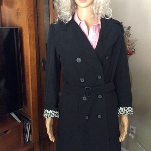 Sleek trench raincoat.